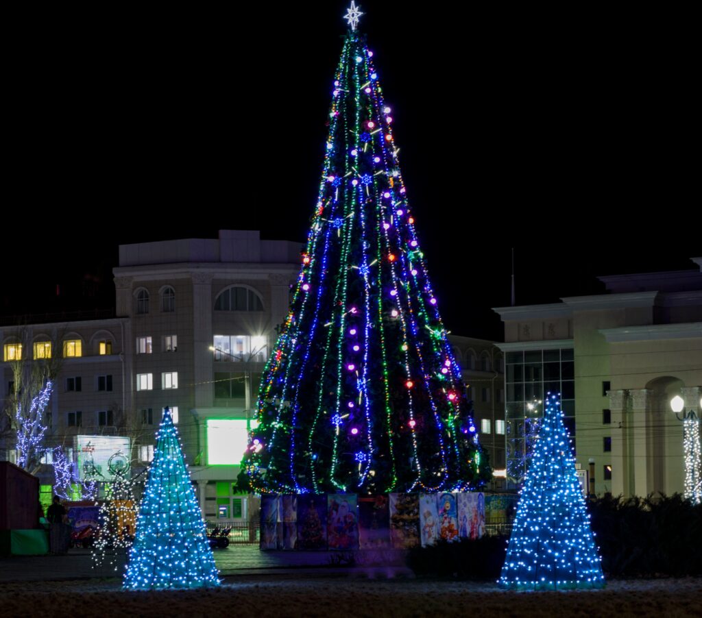 Glowing Blue Christmas Lights And Trees On The Street