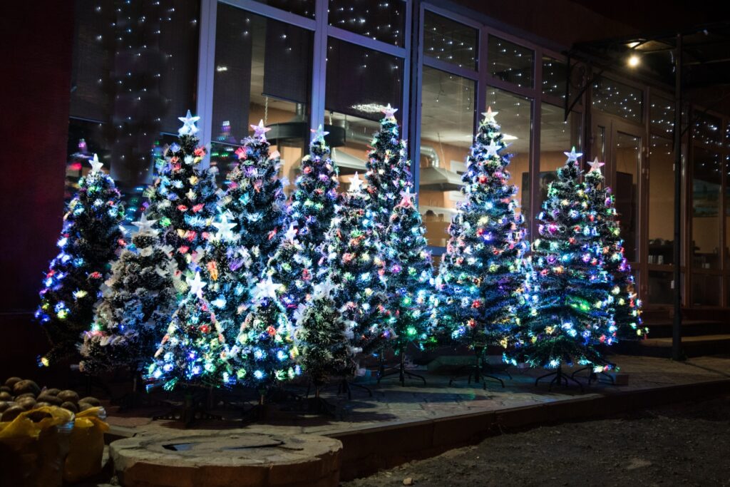 Glowing Christmas Lights And Trees With Multiple Colors
