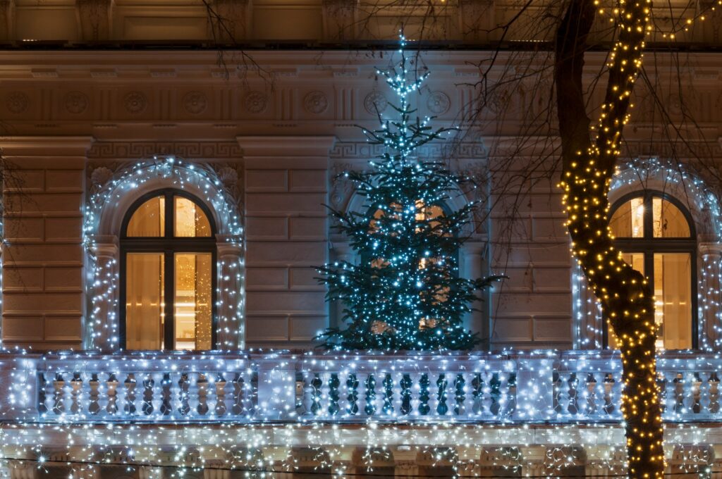 Glowing Blue Christmas Lights And Trees At Home